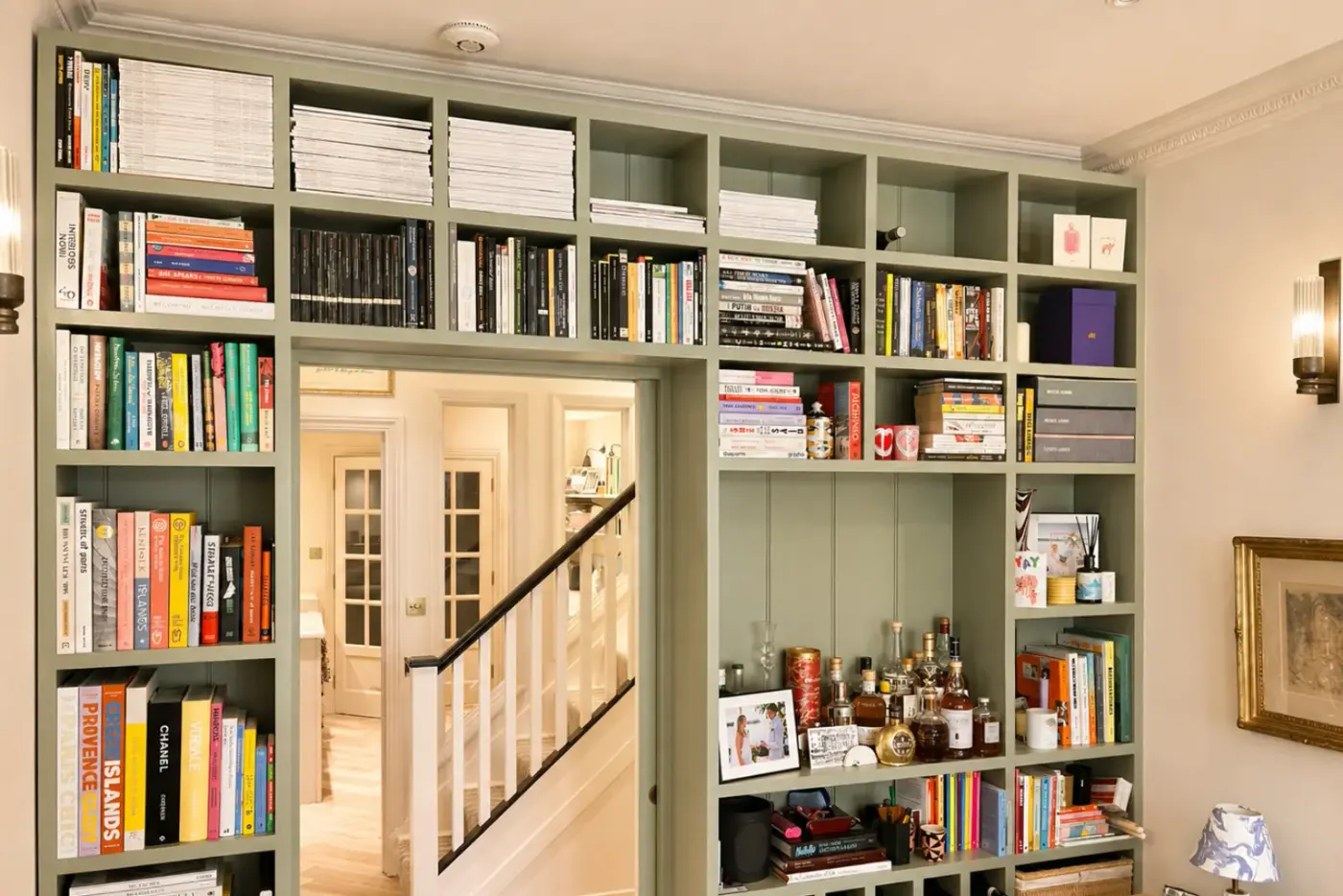 Bespoke painted bookcase joinery framing a doorway